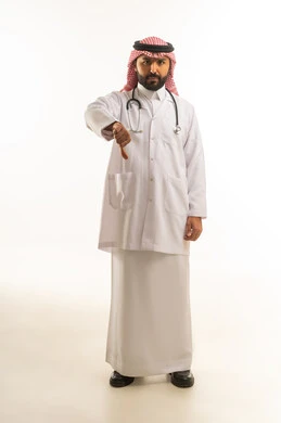 Saudi Male Doctor Showing Thumbs Down Sign