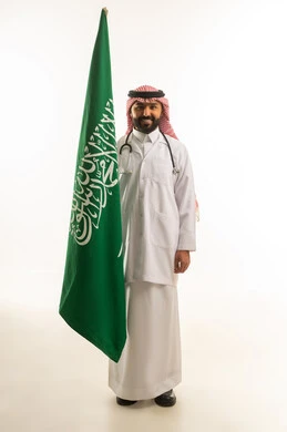 Saudi Male Doctor with National Flag on White Background