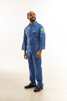 Saudi Technician in Blue Jumpsuit on White Background