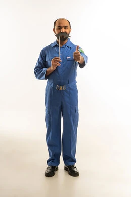 Technician in Blue Jumpsuit with Mustache Prop