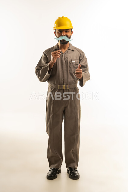 Saudi Construction Worker with Mustache Prop and Thumbs Up