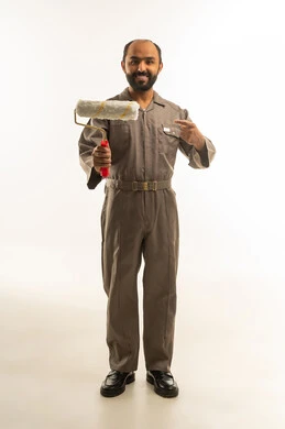 Saudi Painter with Paint Roller on White Background