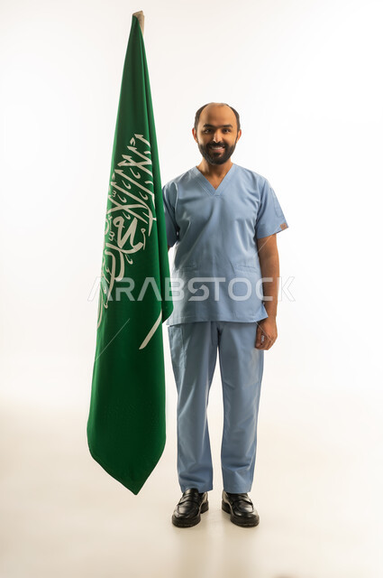 Saudi Male Doctor with Saudi National Flag
