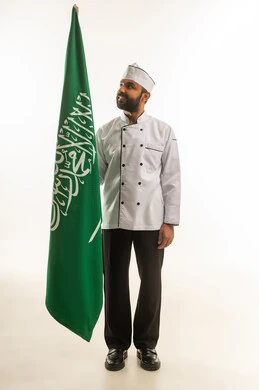 Saudi Male Chef Holding Saudi Arabia National Flag