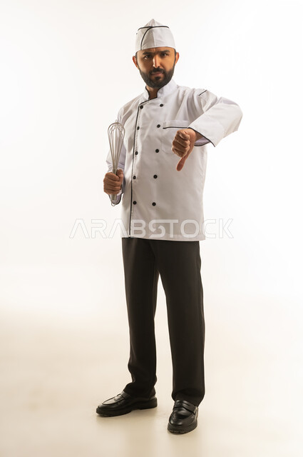 Arab Male Chef Gesturing Thumbs Down on White Background