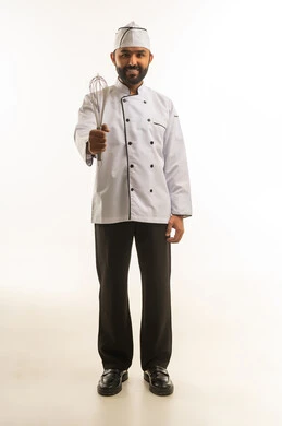 South Asian Chef Holding Whisk on White Background