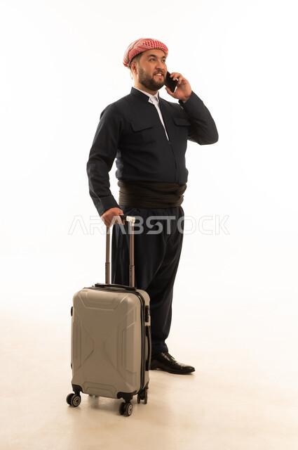Kurdish Man in Traditional Clothing with Suitcase