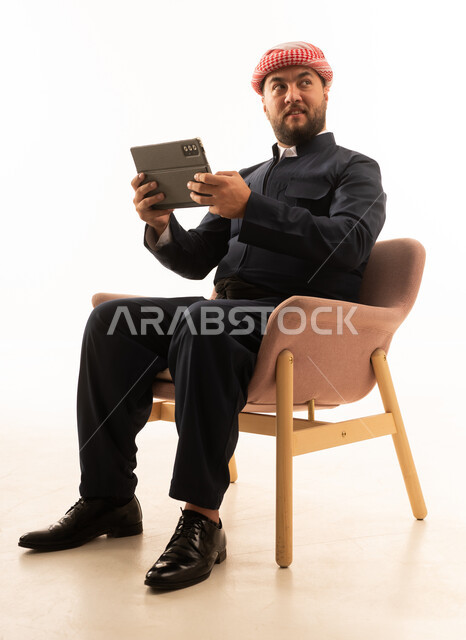 Kurdish Man with Tablet on White Background