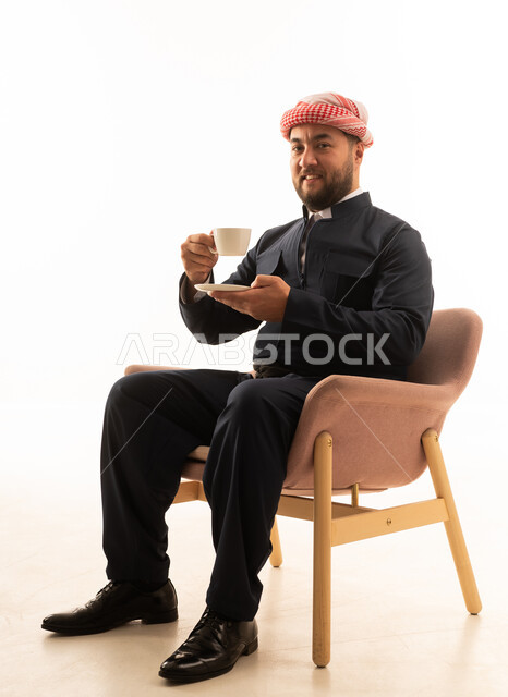 Kurdish Man in Traditional Black Attire with Coffee