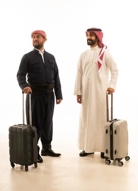 Saudi and Kurdish Men with Suitcases on White Background