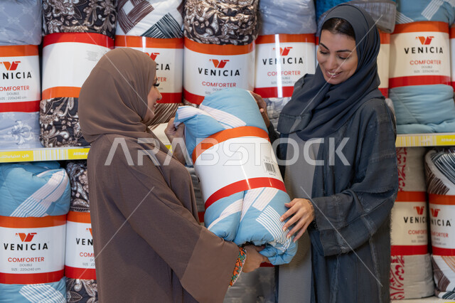 Saudi Women Shopping for Bedding in Home Goods Store