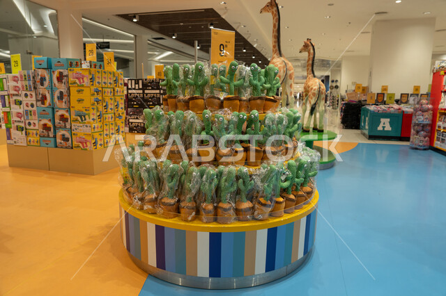 Dancing Cactus Plush Toys on Display in Toy Store