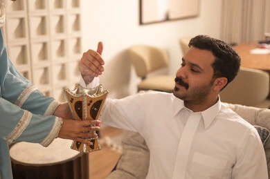 Saudi Man with Traditional Arabic Incense Burner Saudi Man with Traditional Arabic Incense Burner