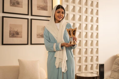 Arab Woman with Traditional Incense Burner in Modern Home