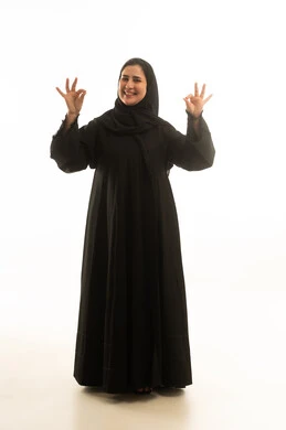 Saudi Woman in Black Abaya Making Okay Sign