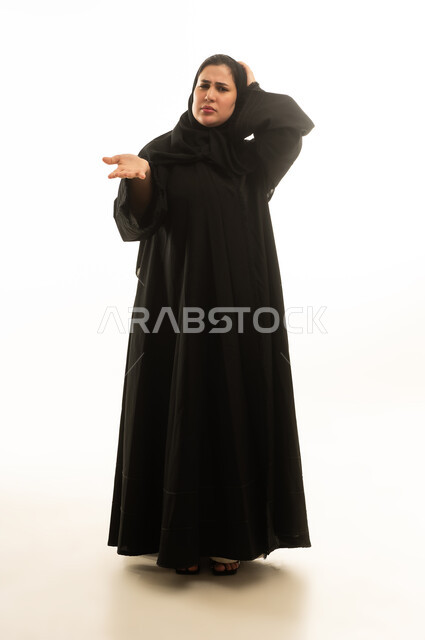 Saudi Woman in Black Abaya Expressing Confusion