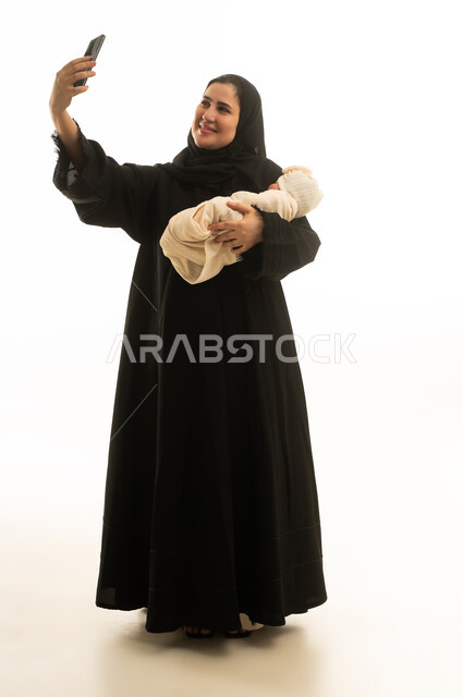 Saudi Mother with Newborn Baby Taking Selfie