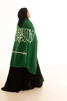 Saudi Woman with National Flag on White Background