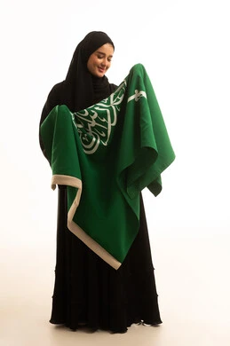 Saudi Woman Holding National Flag on White Background