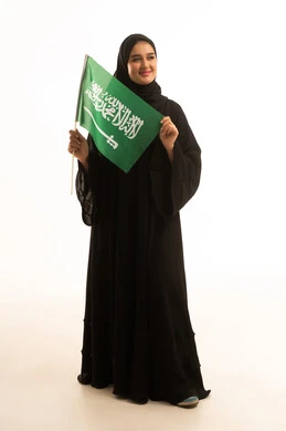 Saudi Woman Holding National Flag on White Background