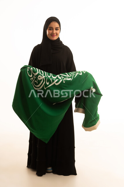 Saudi Woman Holding National Flag on White Background