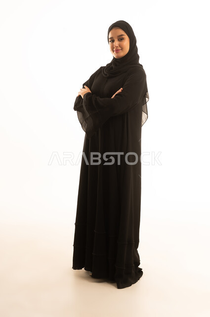 Saudi Woman Portrait in Black Abaya on White Background