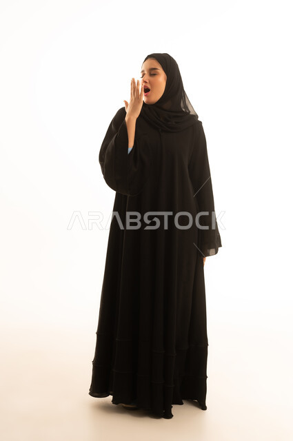 Saudi Woman in Black Abaya Yawning on White Background