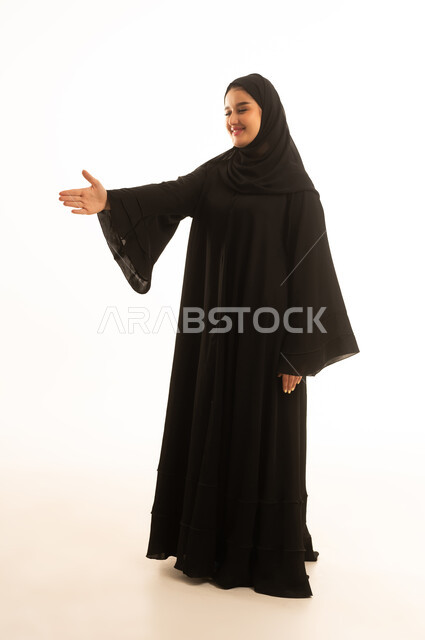 Saudi Woman in Black Abaya Presenting on White Background
