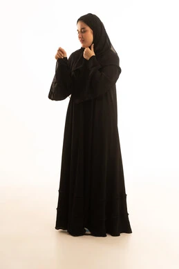 Saudi Woman in Black Abaya on White Background