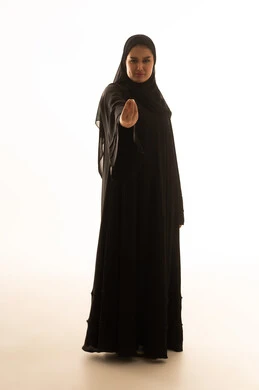 Saudi Woman in Black Abaya Making Hand Gesture