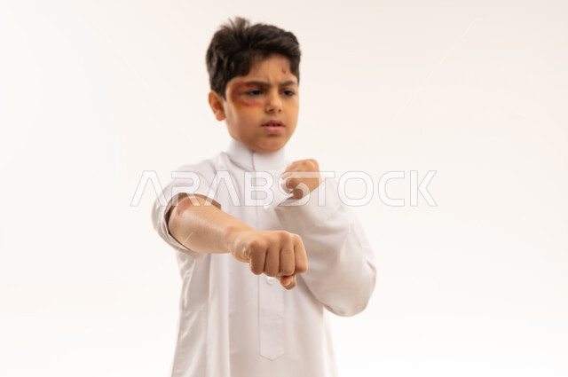 Arab Boy with Facial Bruises in Fighting Stance