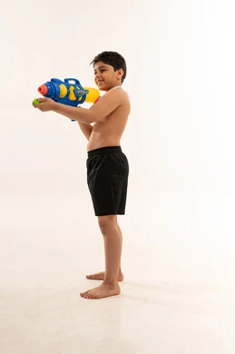 Saudi Boy with Water Gun on White Background
