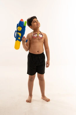 Saudi Boy with Water Gun on White Background