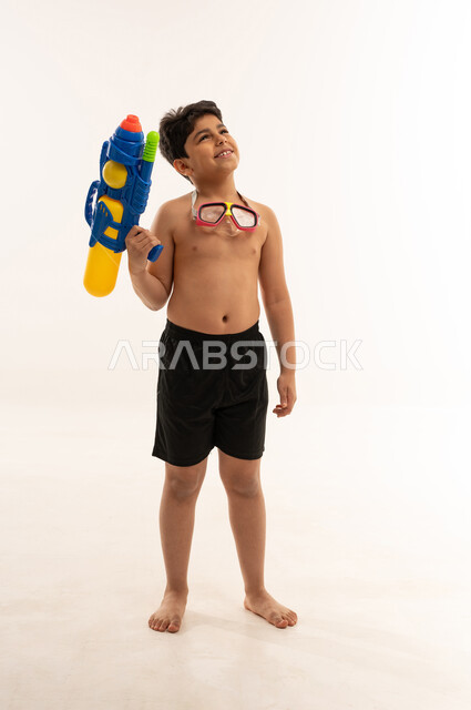 Arab Boy with Water Gun and Swimming Goggles