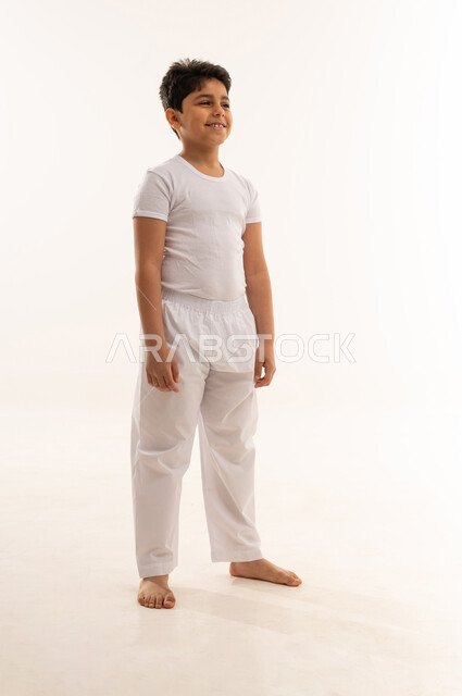 Saudi Boy in Traditional White Clothing Studio Shot
