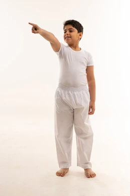 Arab Boy Pointing Finger on White Studio Background