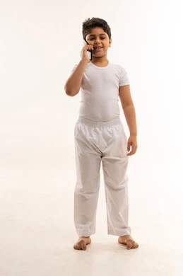 Saudi Boy Talking on Mobile Phone in Studio