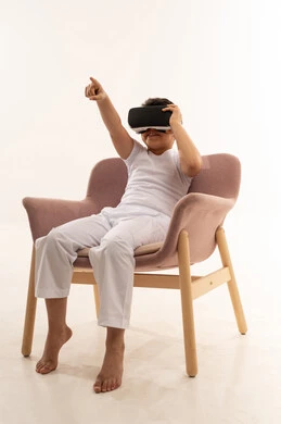 Arab Boy Using VR Headset on White Background