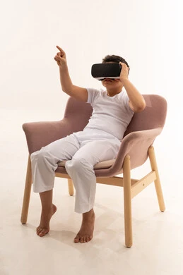 Saudi Boy Using VR Headset on White Background