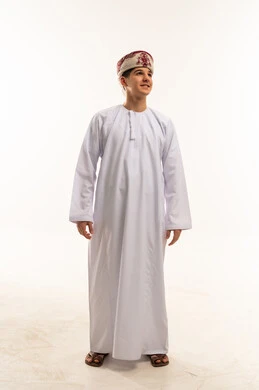 Young Omani Man in Traditional Dishdasha and Kumma