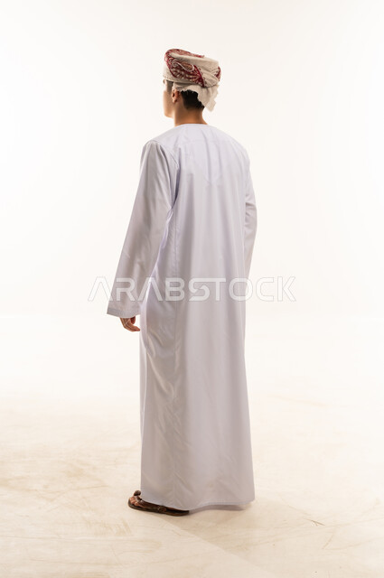 Omani Man in Traditional Dishdasha Back View