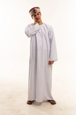 Omani Man in Traditional Dress with Neck Pain
