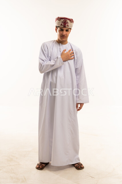 Omani Man in Traditional Dishdasha and Kummah