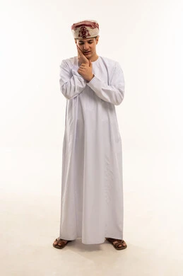 Omani Man in Traditional Dress with Toothache Pain