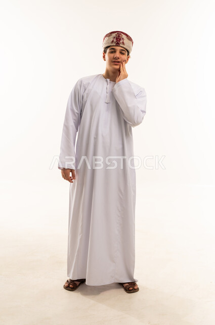 Omani Man in Traditional Dress with Toothache Pain