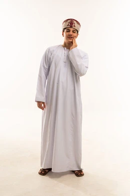 Omani Man in Traditional Dress with Toothache Pain