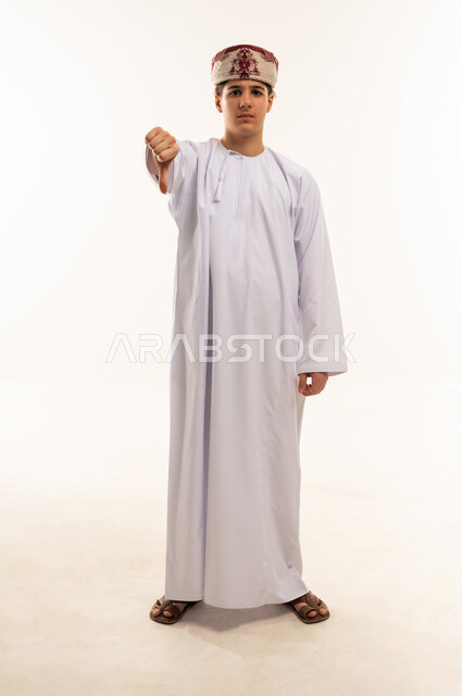 Omani Boy Traditional Clothing Thumbs Down Gesture
