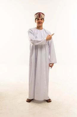 Omani Man in Traditional Dishdasha Pointing Aside