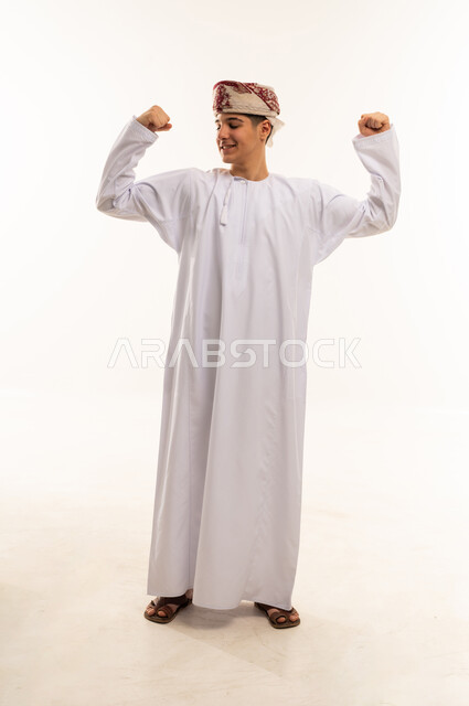 Omani Man Flexing Muscles in Traditional Dishdasha