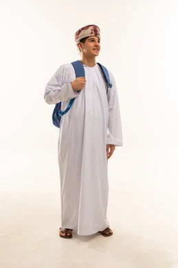 Omani Student in Traditional Dishdasha with Backpack